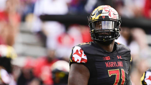 Maryland offensive lineman Jaelyn Duncan stands on sideline